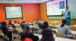 Faculty member lectures in a science classroom